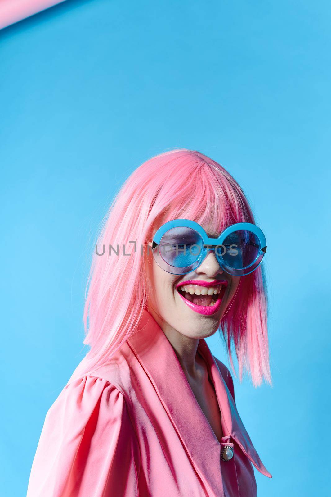 glamorous woman fashion blue glasses makeup fashion isolated background. High quality photo