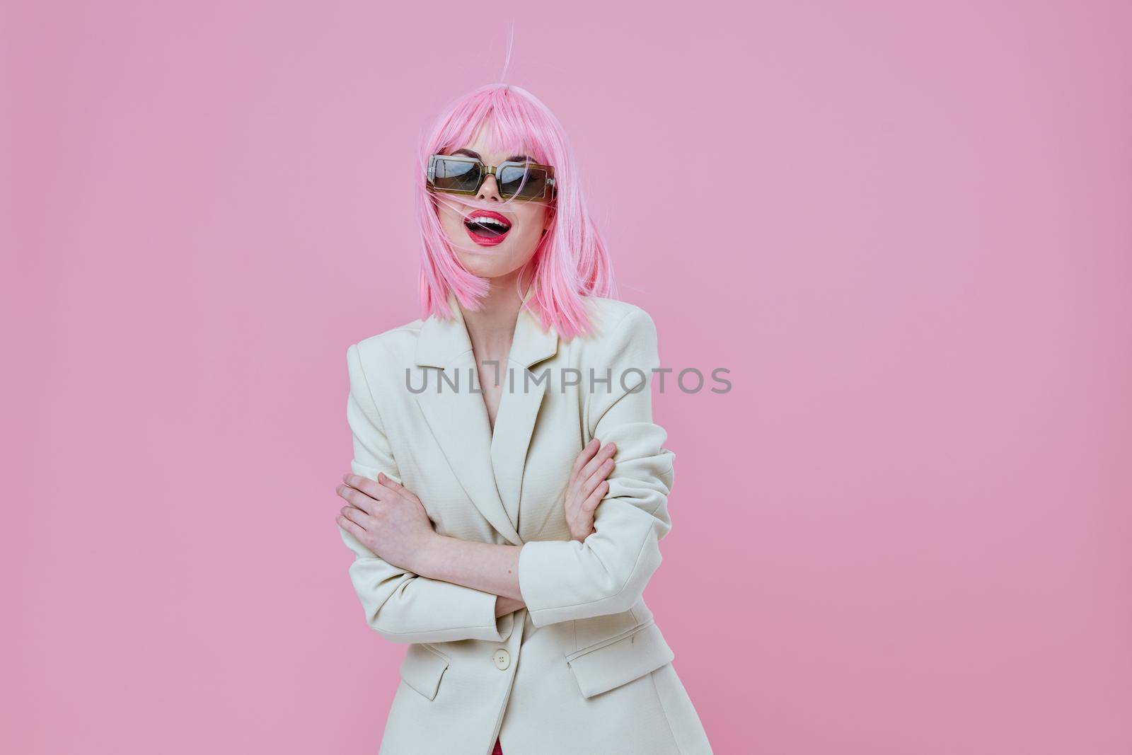 Portrait of a charming lady wearing sunglasses pink hair posing color background unaltered by SHOTPRIME