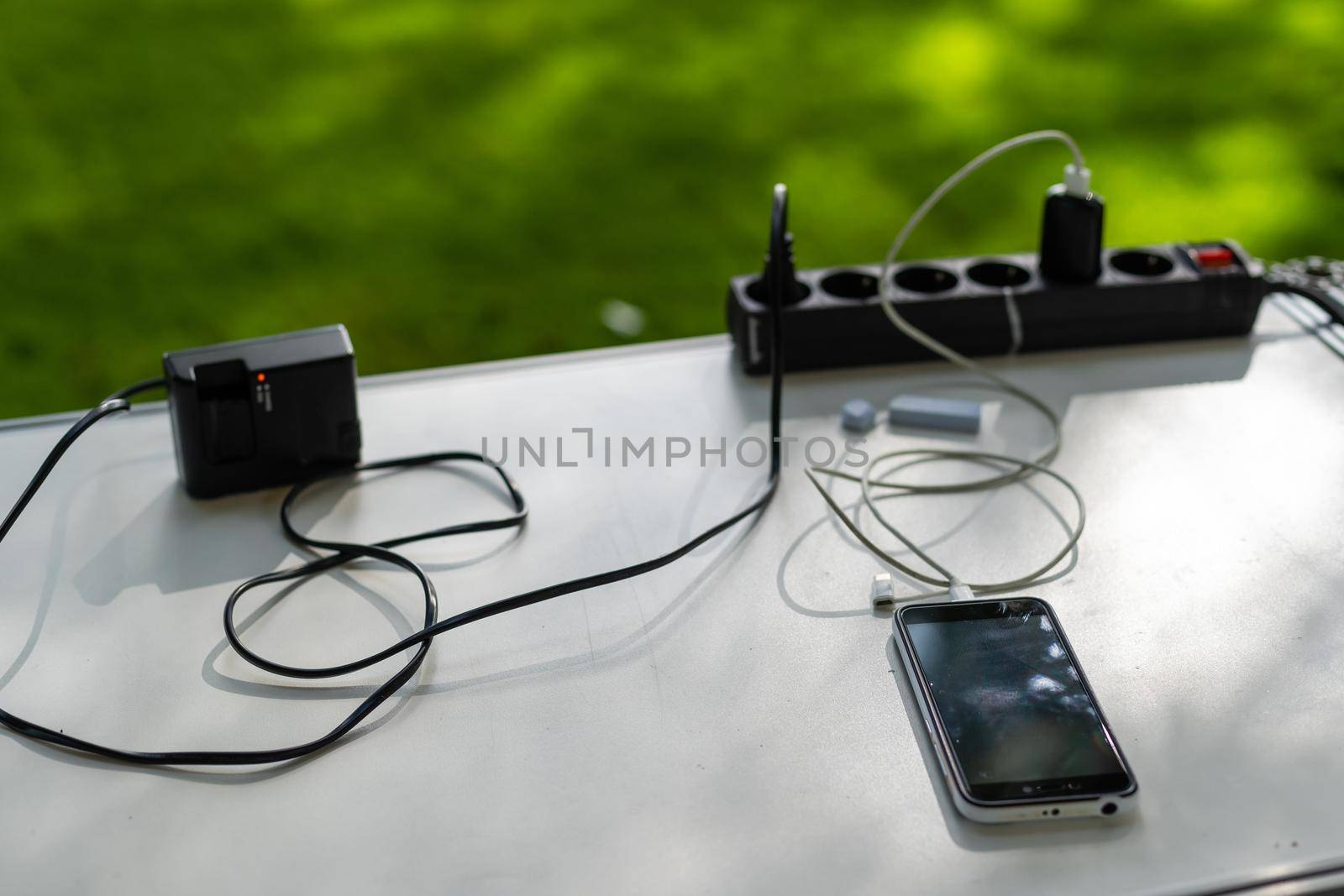 Phone charging with energy bank. Depth of field on Power bank.