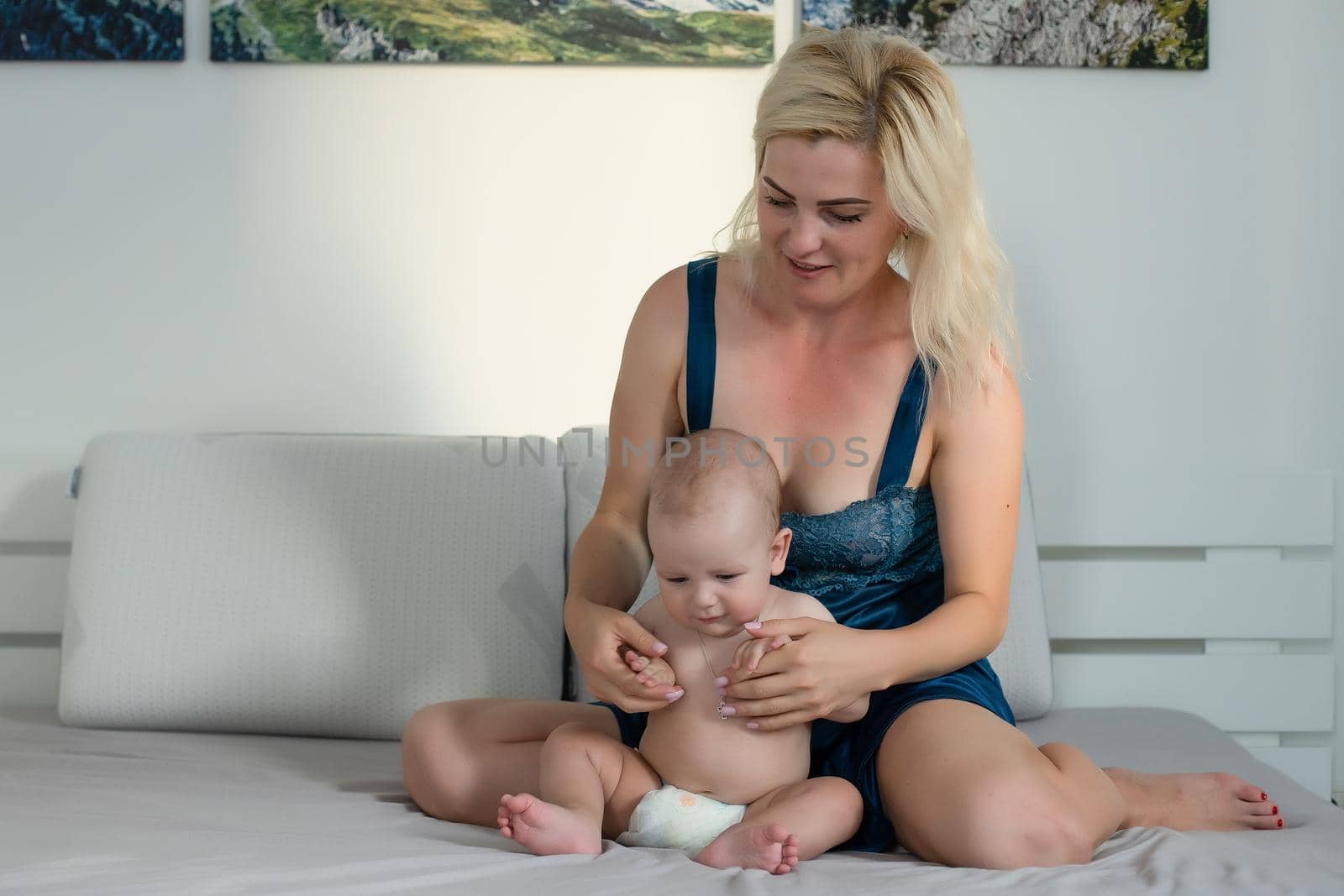 picture of happy mother with baby over white.