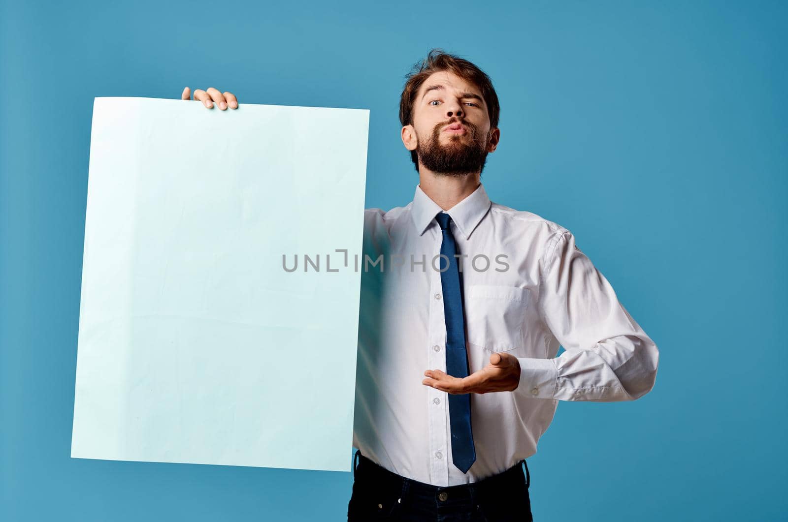 Cheerful man blue banner copy-space advertising presentation isolated background. High quality photo