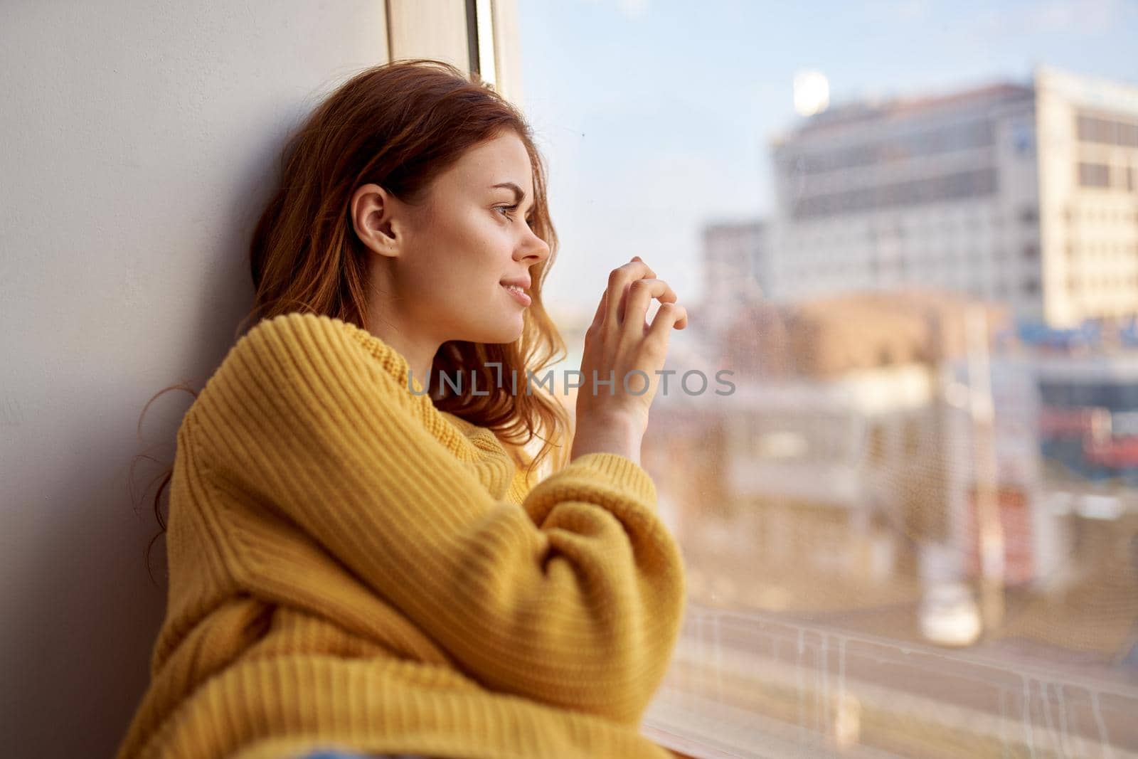 pretty woman lies on the windowsill Lifestyle by SHOTPRIME