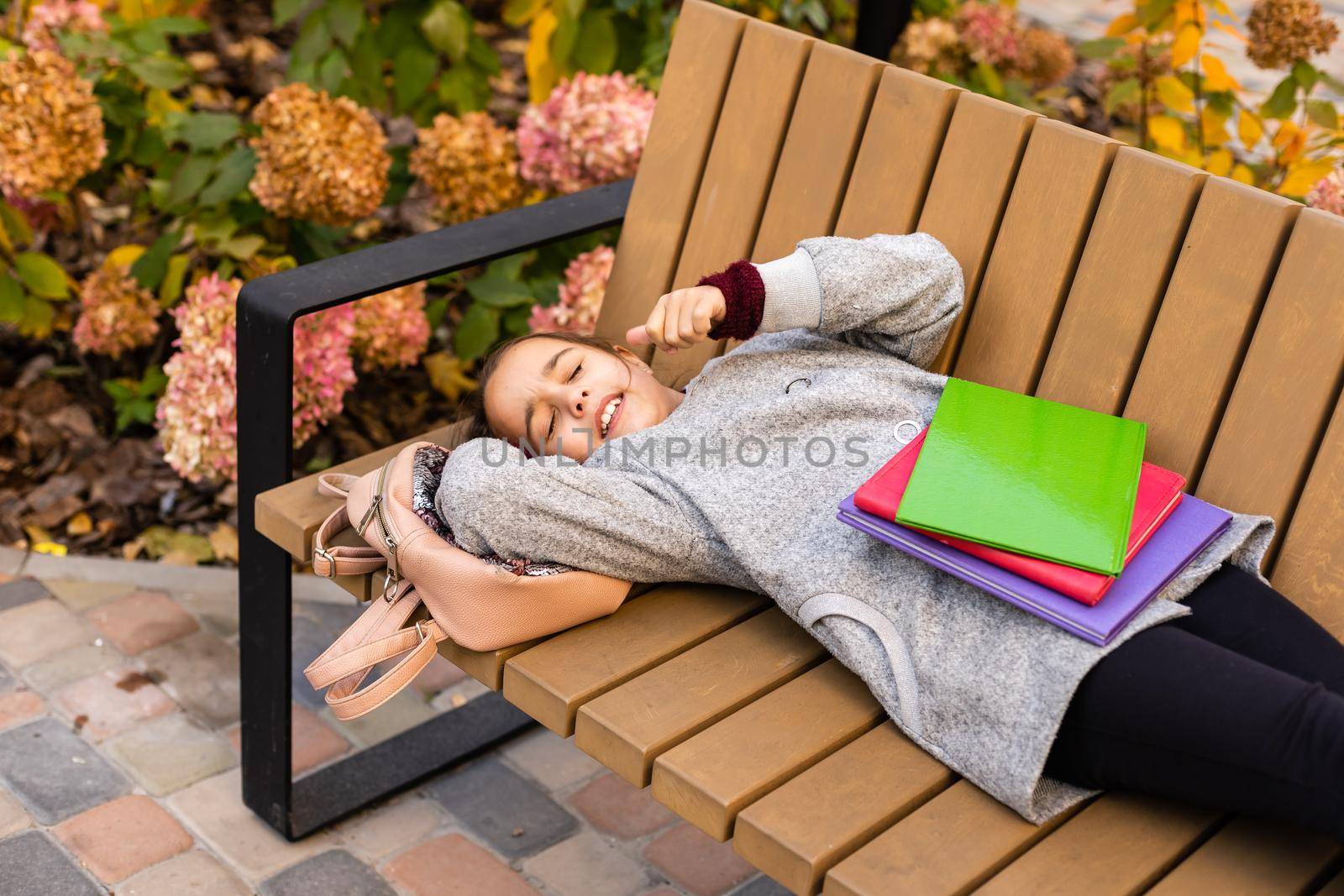 School club. Modern education. Private schooling. Teen with backpack. Stylish smiling schoolgirl. Girl little fashionable schoolgirl carry backpack school building background. Schoolgirl daily life