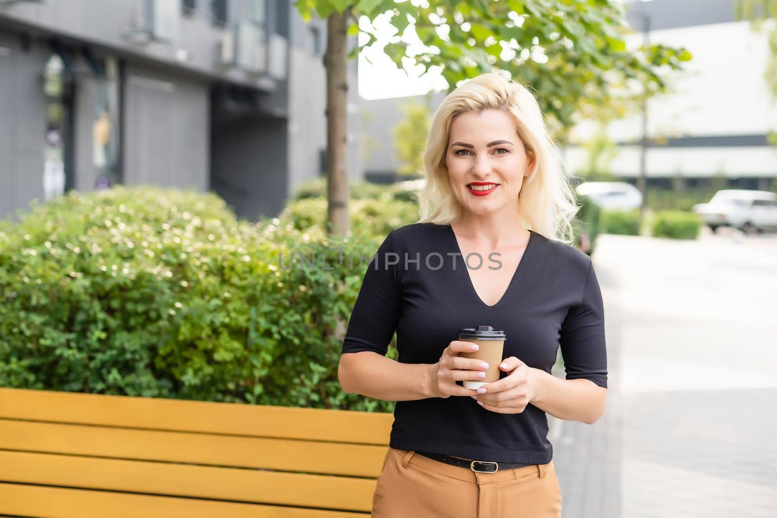 woman with coffee, enjoying weekend. by Andelov13