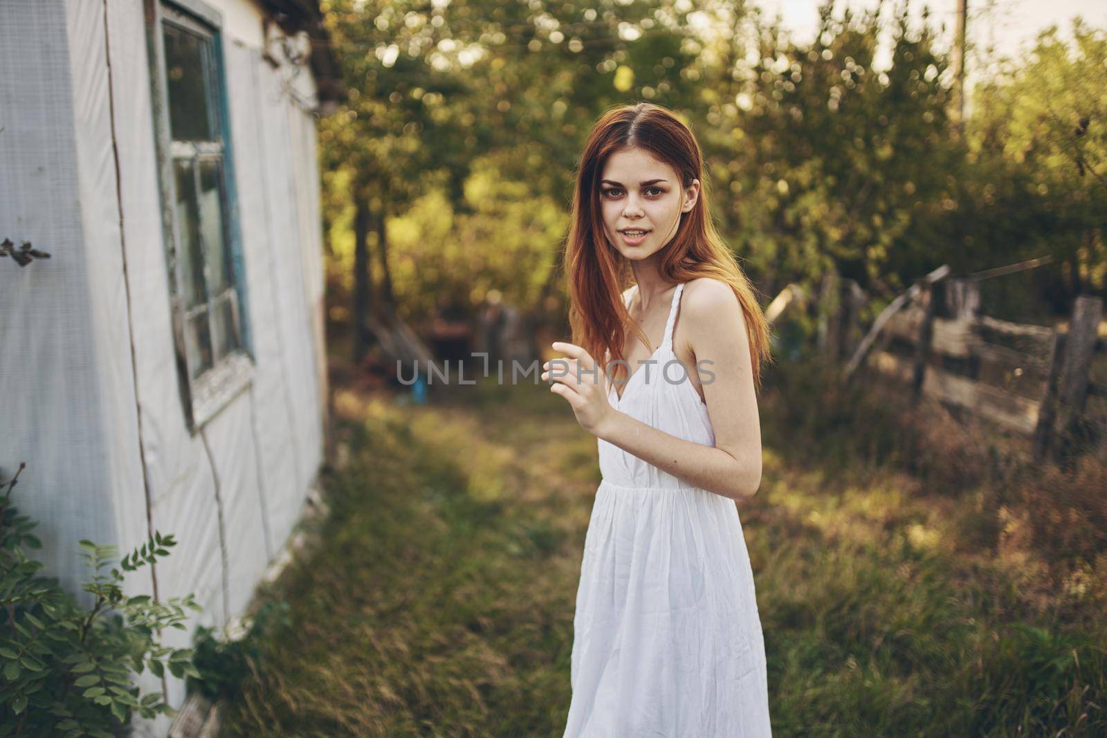 woman summer countryside Sun freedom. High quality photo