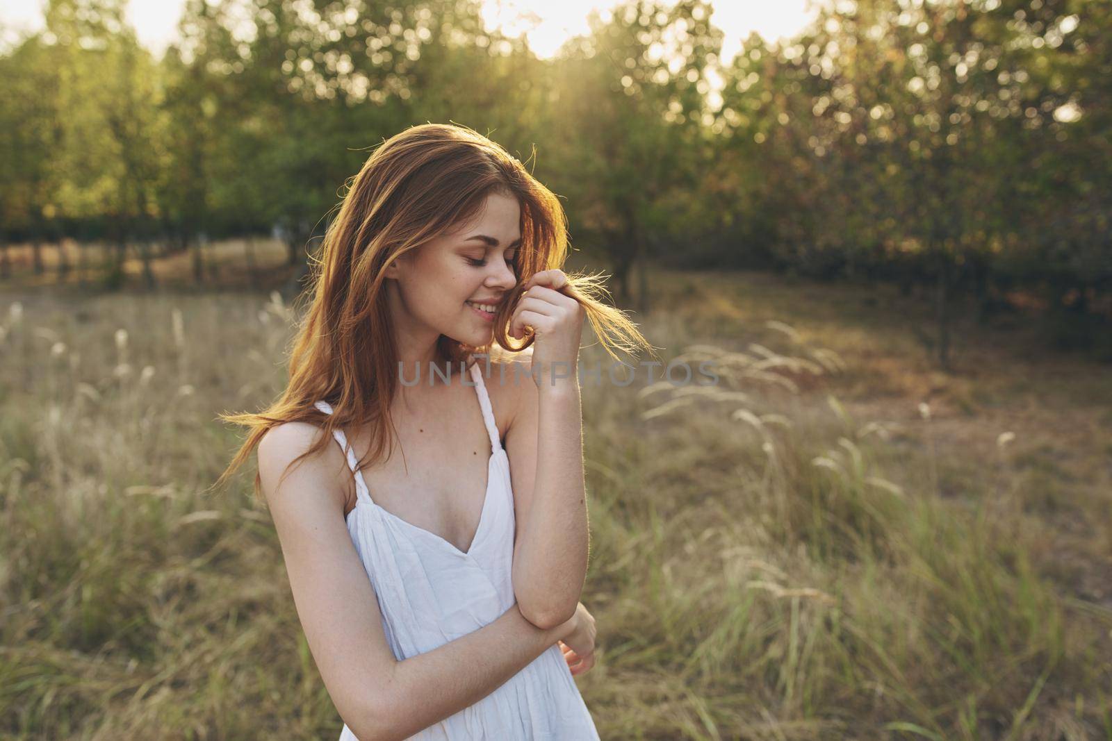 cheerful woman nature freedom in the field walk fresh air by SHOTPRIME