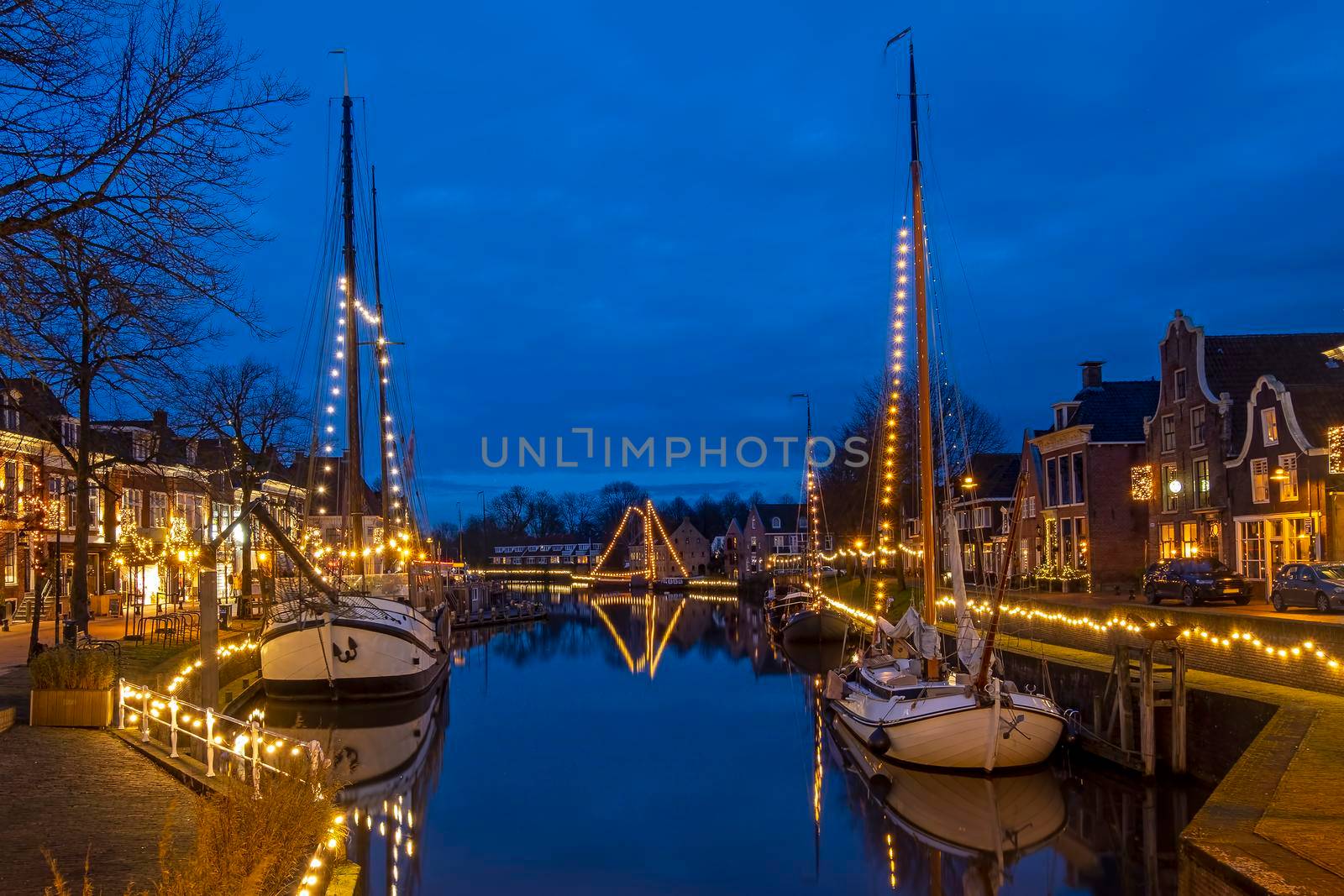The historical village Dokkum in christmas time in the Netherlands at night by devy