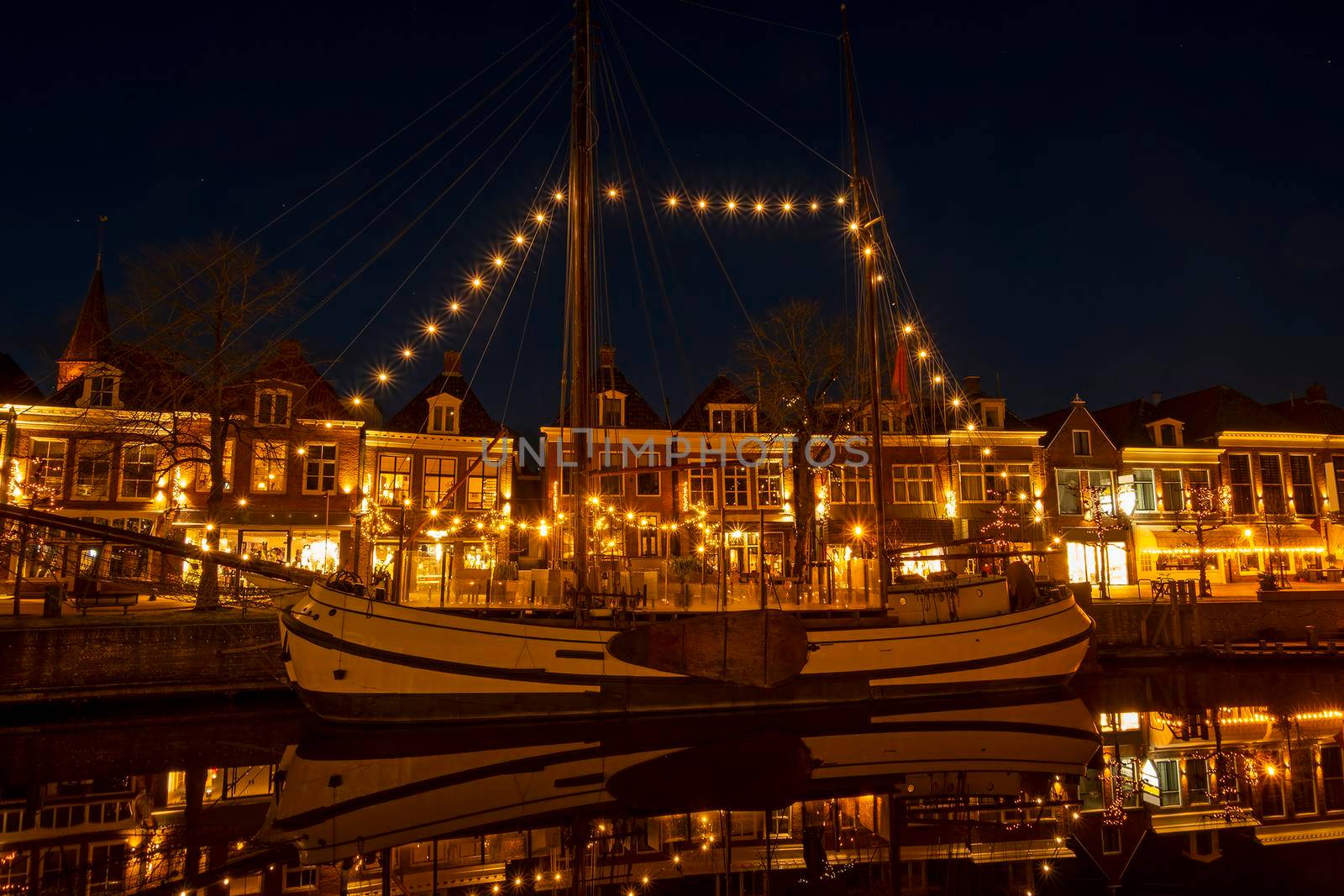 Historical city Dokkum in christmas time in the Netherlands at night by devy