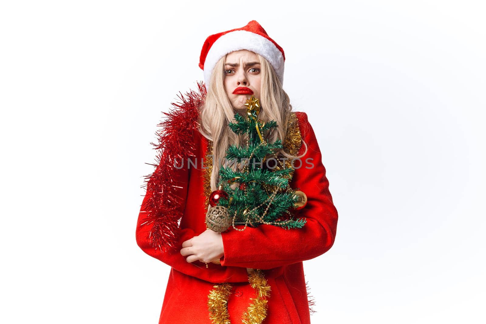 woman in santa hat christmas tree toys decoration holiday. High quality photo