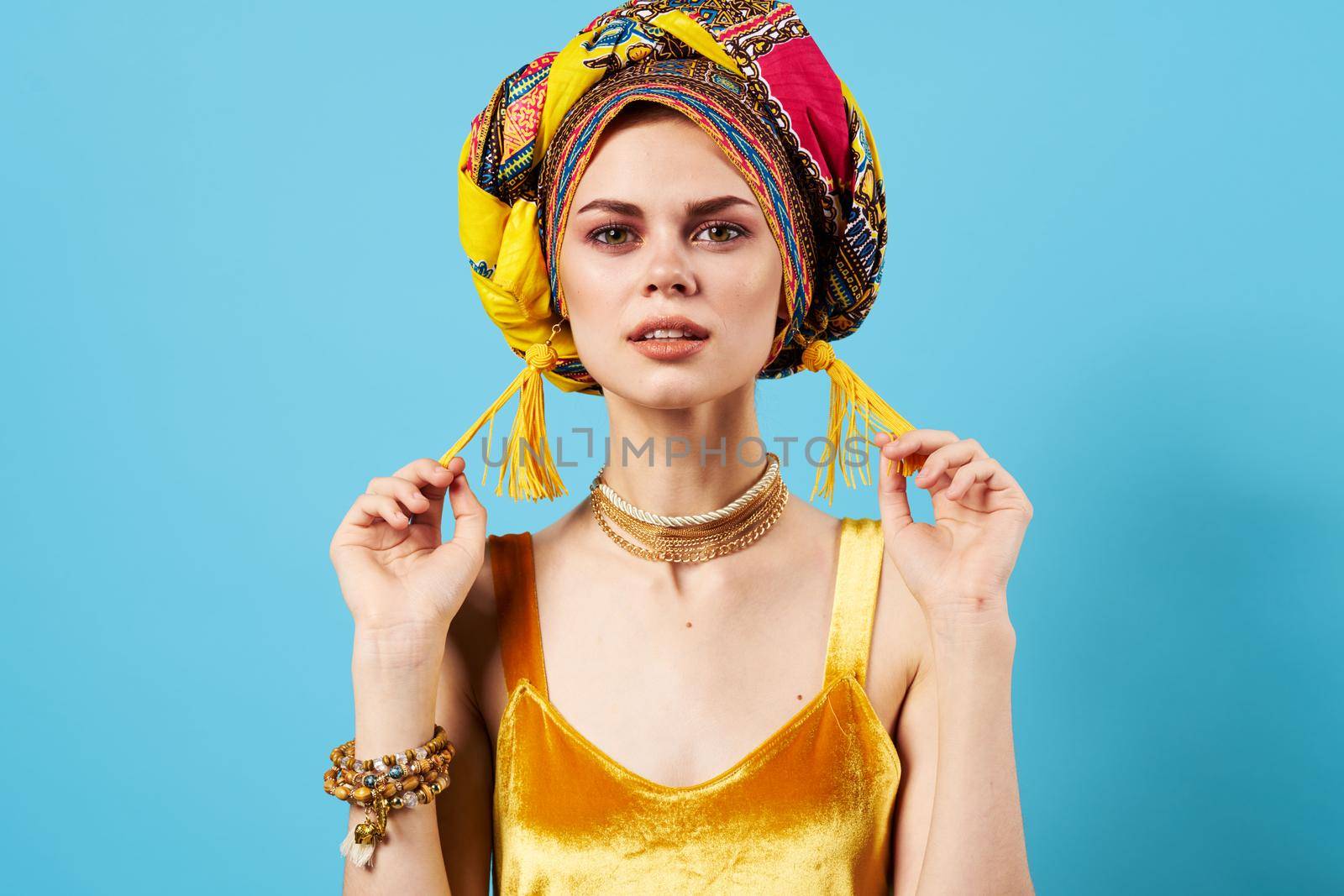 beautiful woman multicolored shawl ethnicity african style decorations isolated background. High quality photo