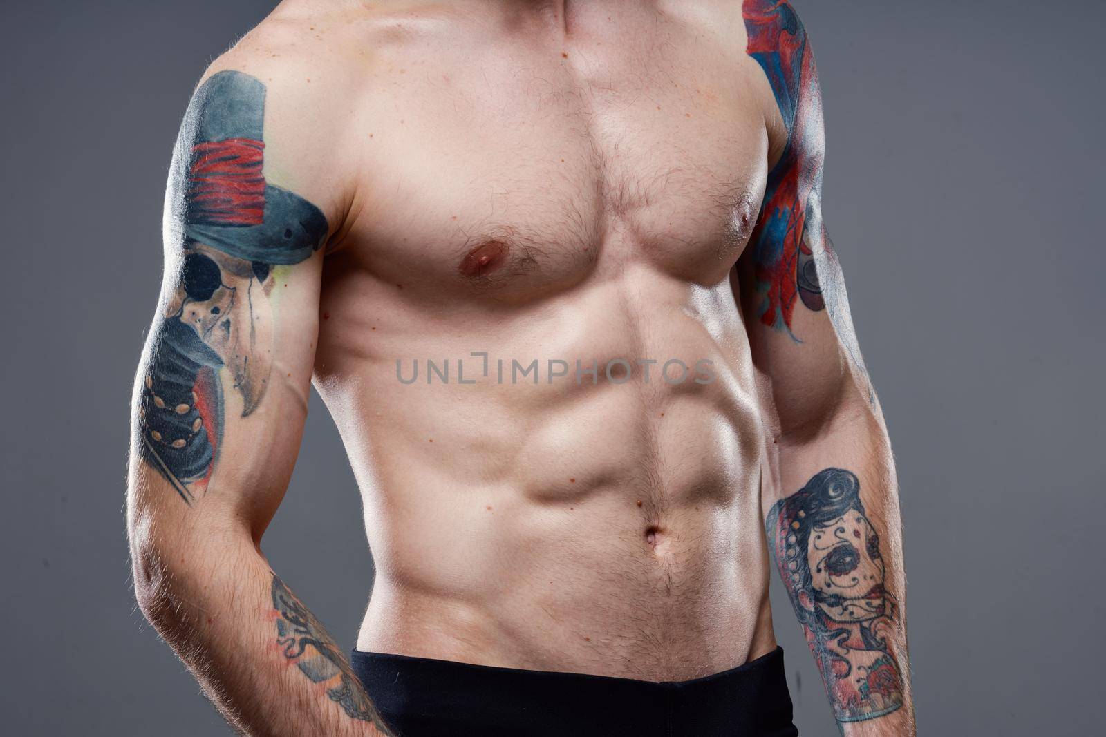 pumped up abs gym workout close-up. High quality photo