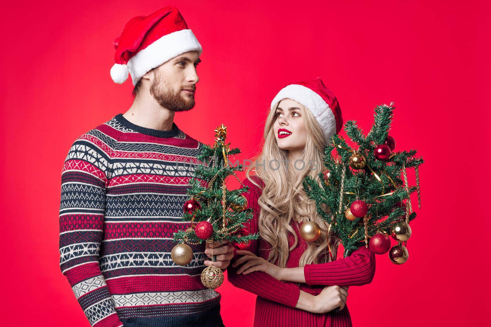 man and woman holiday christmas emotions romance. High quality photo