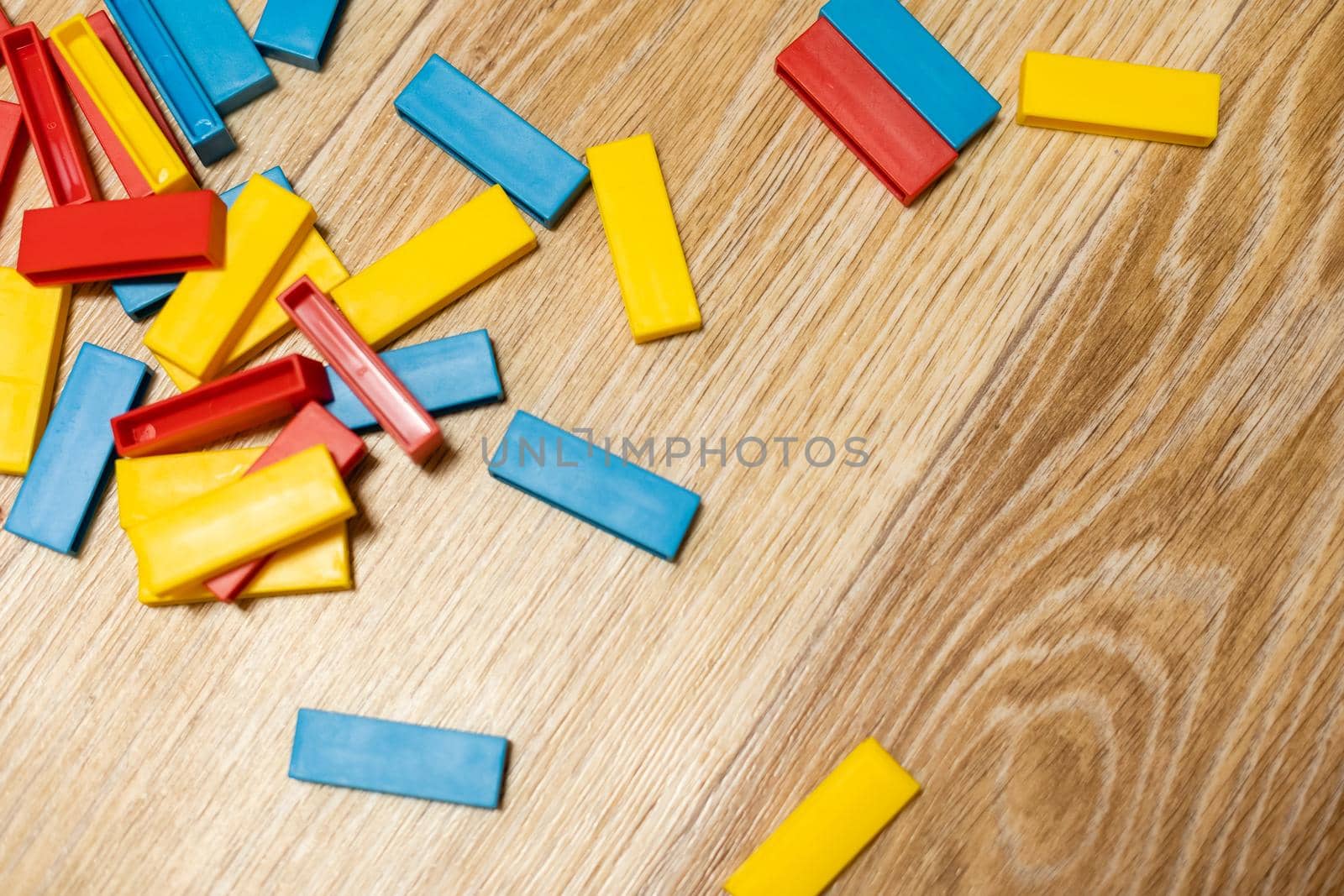 colorful wooden cubes, color blocks on the floor.