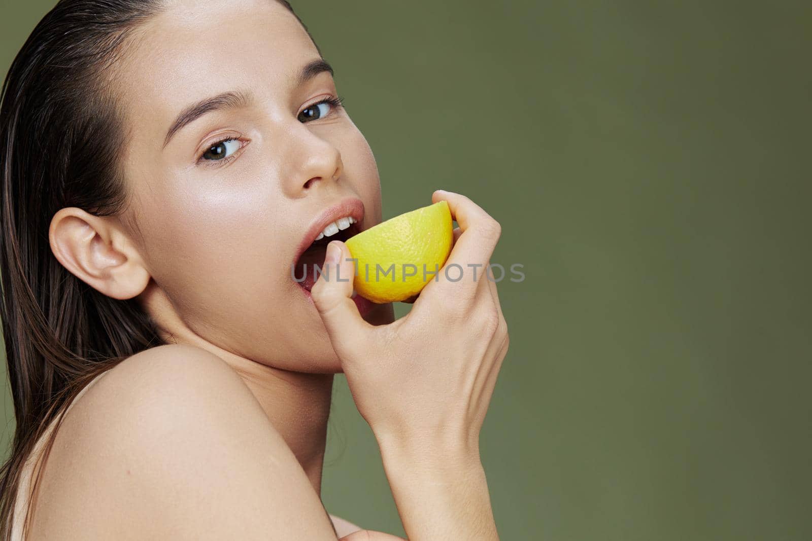 woman lemon vitamins health cosmetology close-up Lifestyle. High quality photo