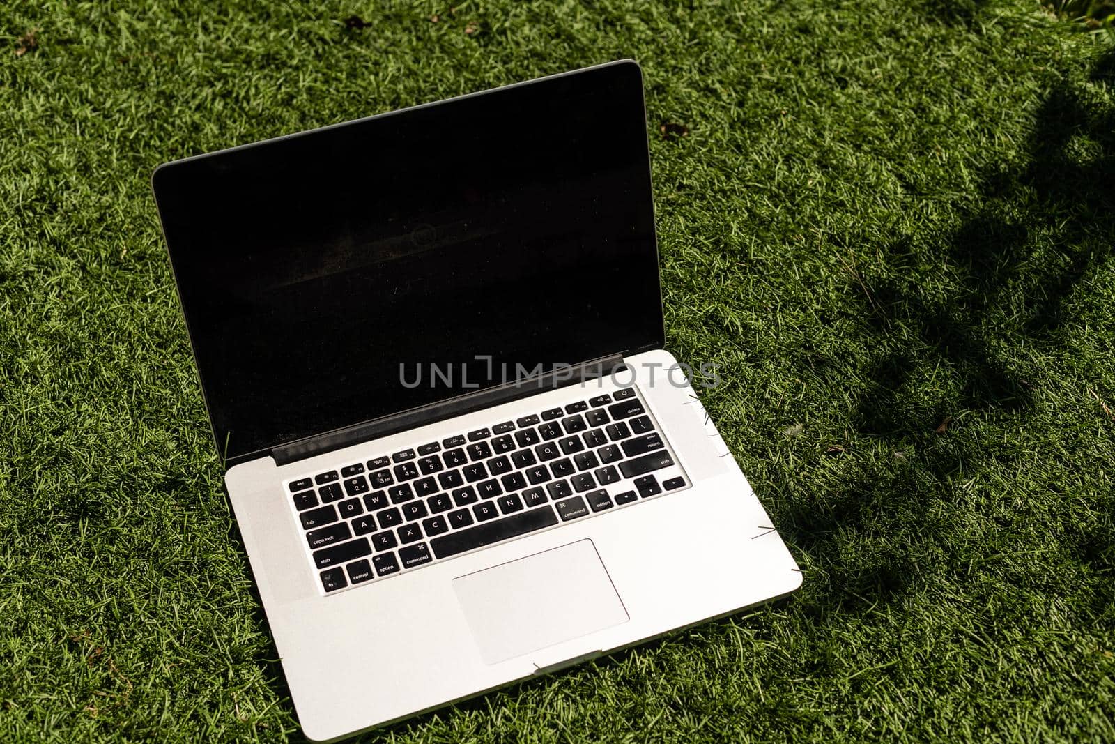 Laptop on the garden, close-up. by Andelov13
