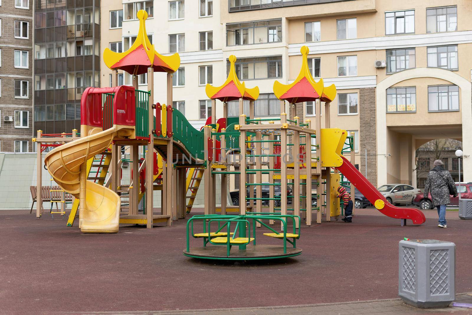 Colorful houses on the playground in the courtyard of the condominium by vizland