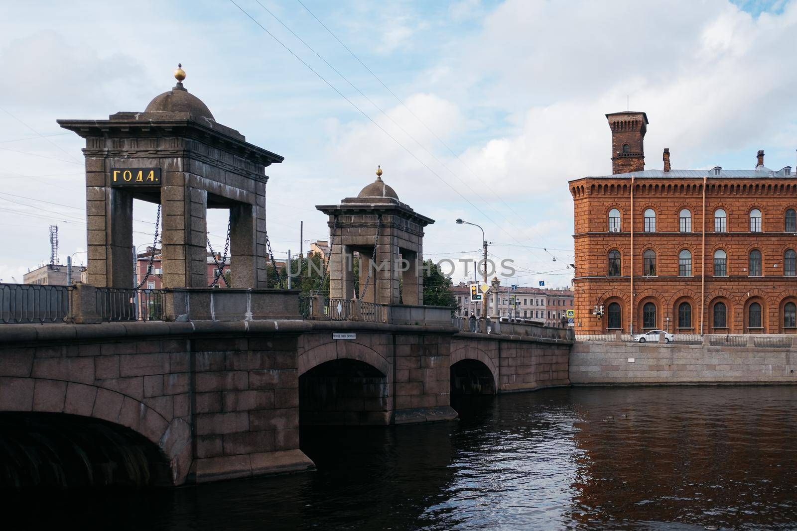 Saint-Petersburg, Russia, 06 September 2020: Stone Staro-Kalinkin Bridge across the Fontanka River in the Admiralteisky District. Built in 1780s.