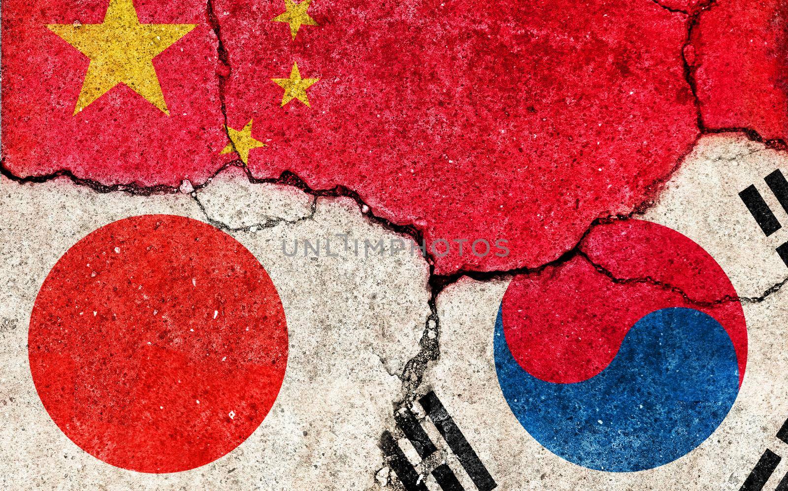 Grunge flags illustration of three countries with conflict and political problems (cracked concrete background) | China, Japan and South korea