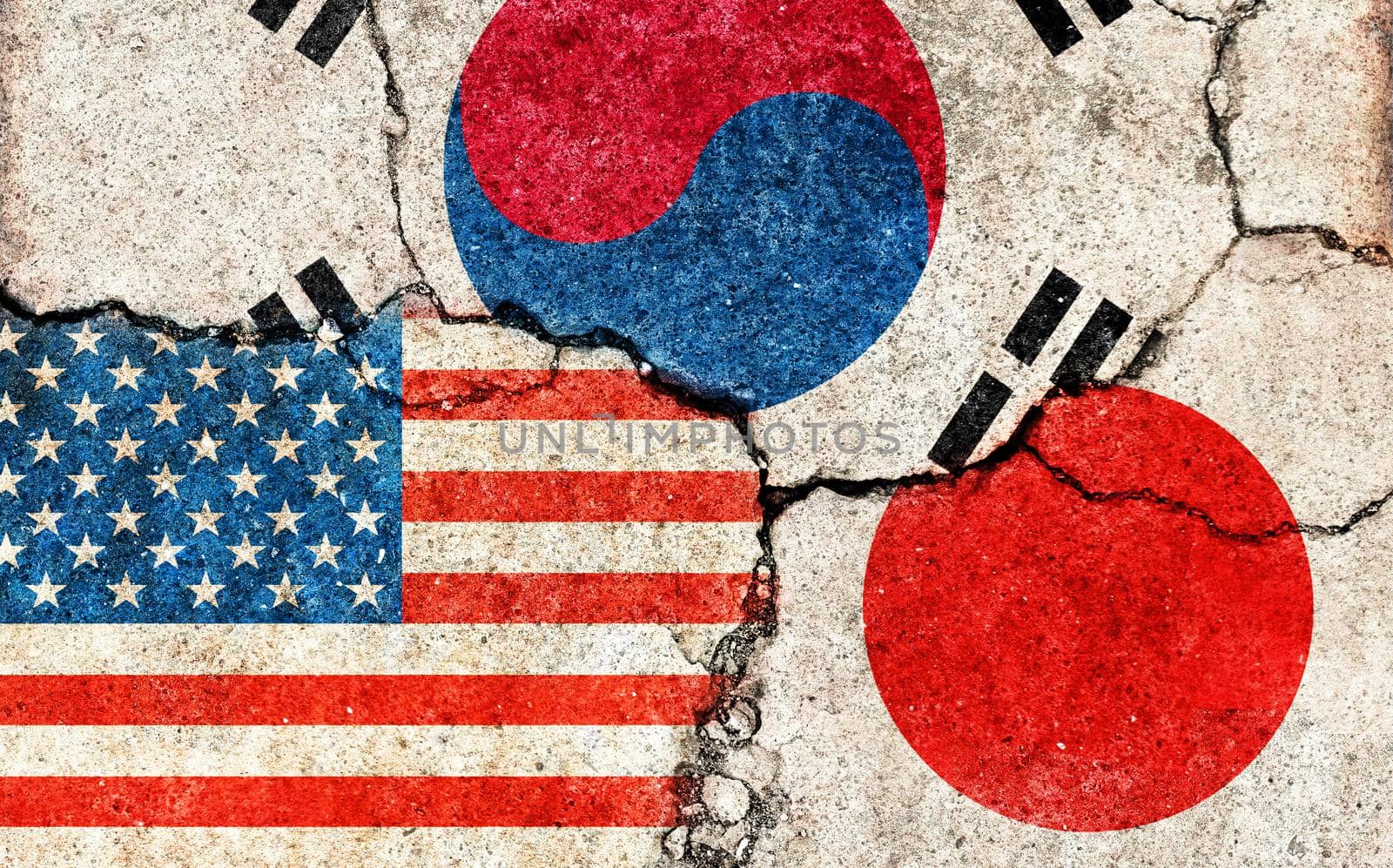 Grunge flags illustration of three countries with conflict and political problems (cracked concrete background) | USA, Japan and South korea
