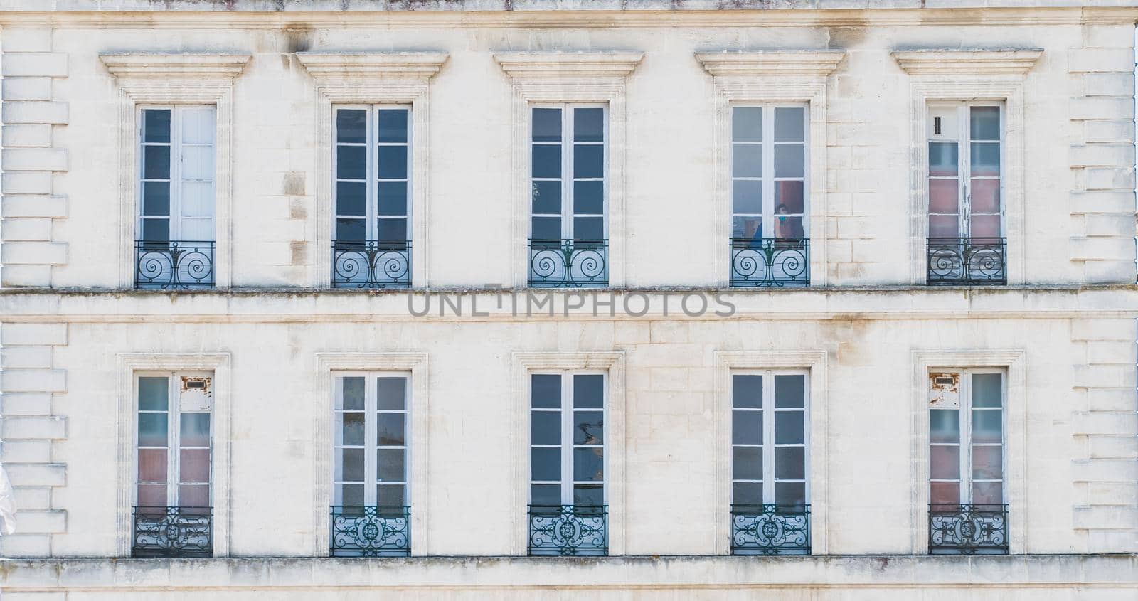 Architectural building with windows and railings o Rochefort in France