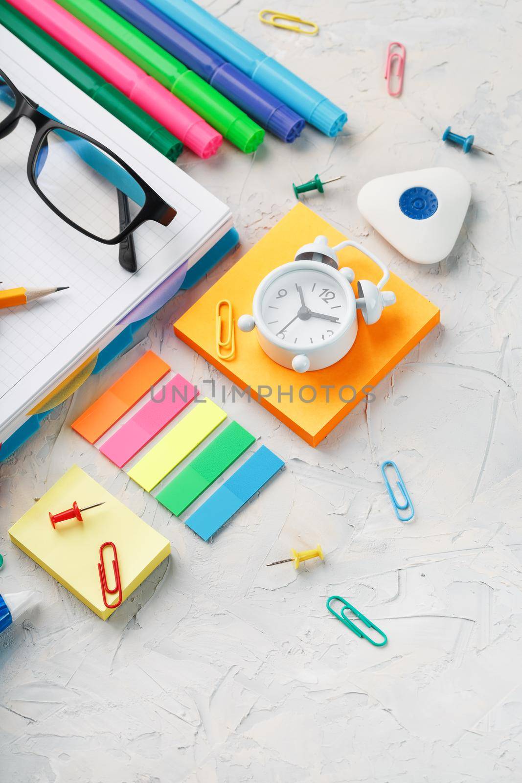 Stationery for school and creative work are on a gray background. Free space, top view