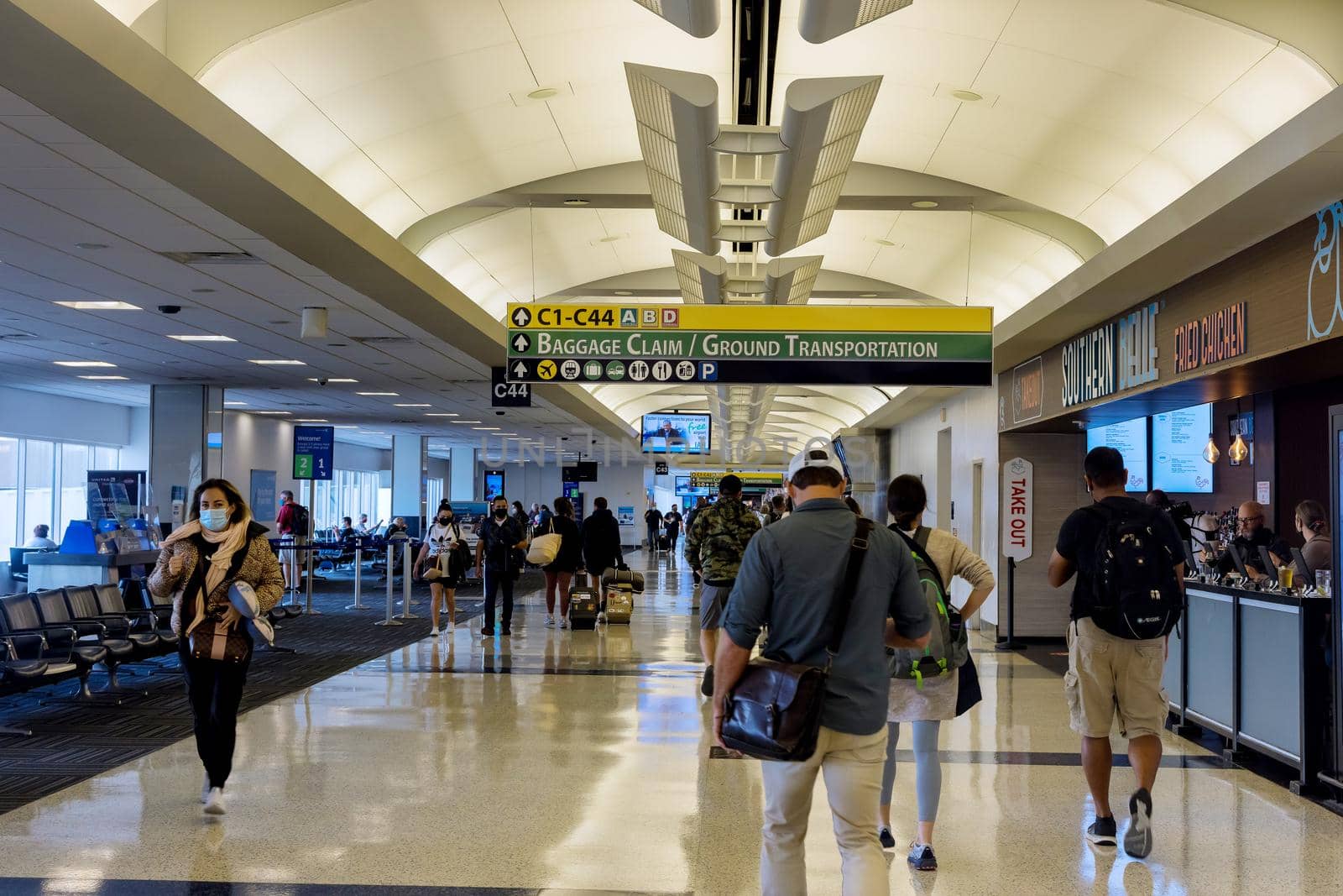 20 September 2021 Houston TX USA: Unidentified passengers walking in airport Houston Intercontinental Airport, Houston, TX