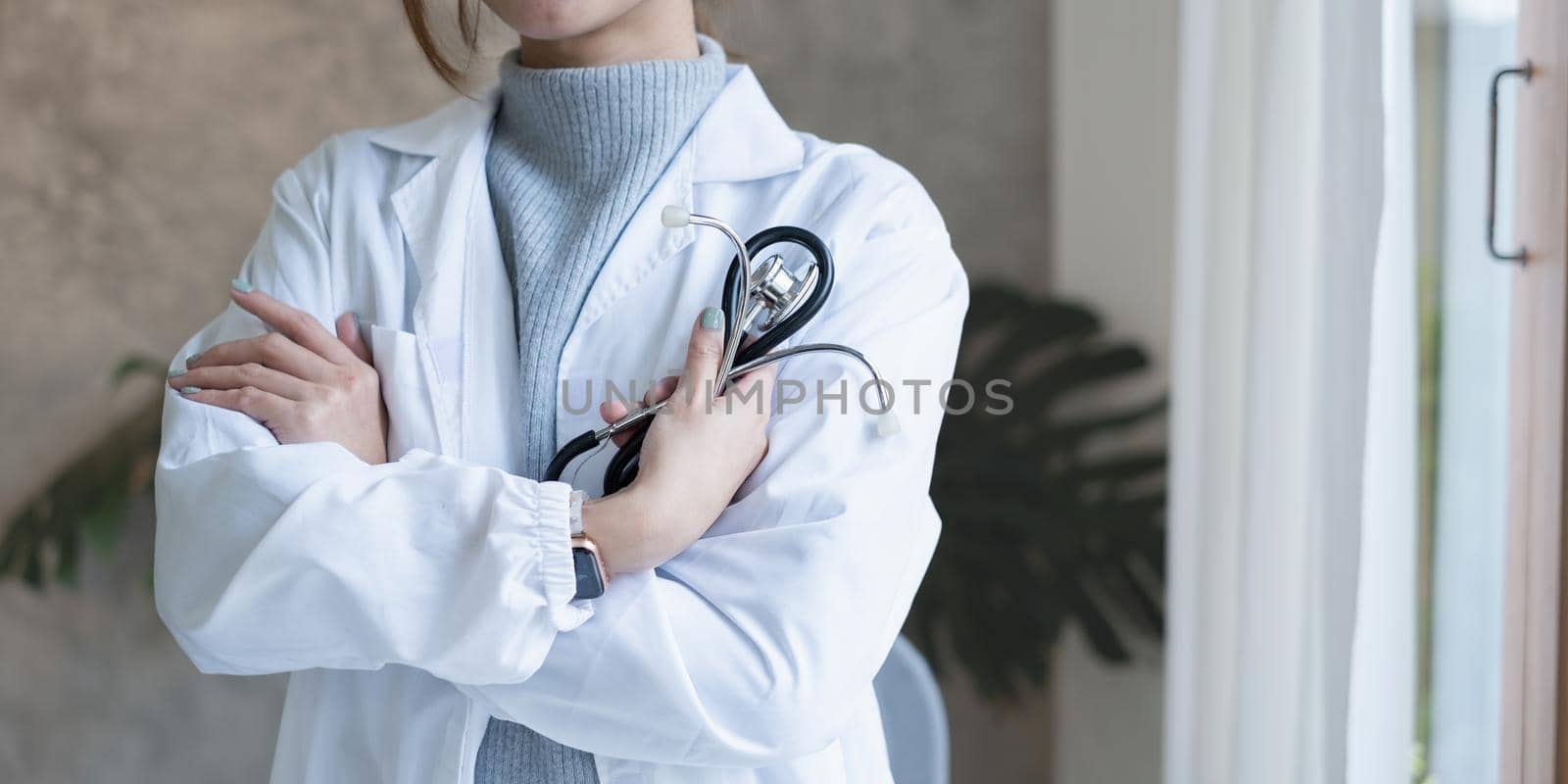 Adult doctor or surgeon in a classroom, ready to instruct. Healthcare and medical concept