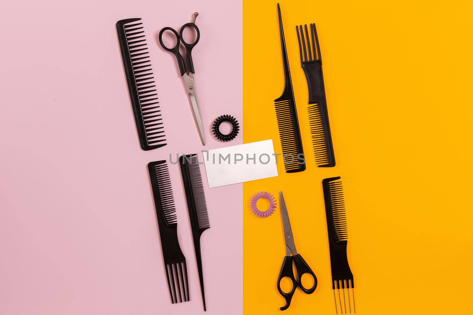 Combs and hairdresser tools on color background top view. Copy space. Flat lay. Still life. Mock-up