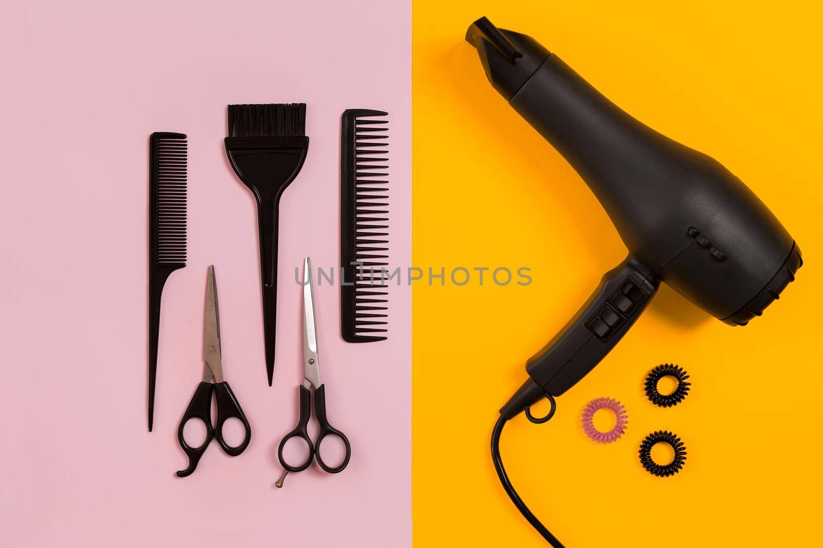 Combs and hairdresser tools on color background top view. Copy space. Flat lay. Still life. Mock-up