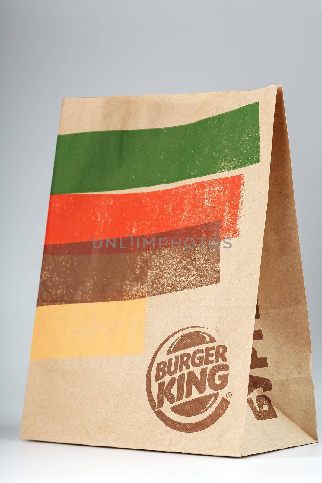 Russia, Moscow - May 17, 2021: Paper packaging with an order from Burger King on a white background. Burger King is a global fast food hamburger chain with headquarters worldwide by AlexGrec
