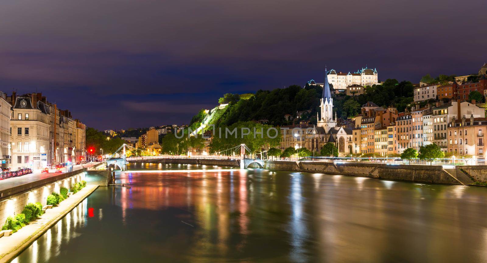 The banks of the Saone at dusk in Lyon in the Rhone, France by Frederic