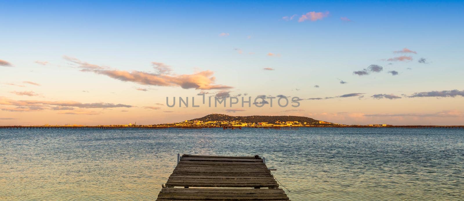 Mont Saint Clair and the Thau pond with its oyster tables in Hérault, Occitanie, France by Frederic