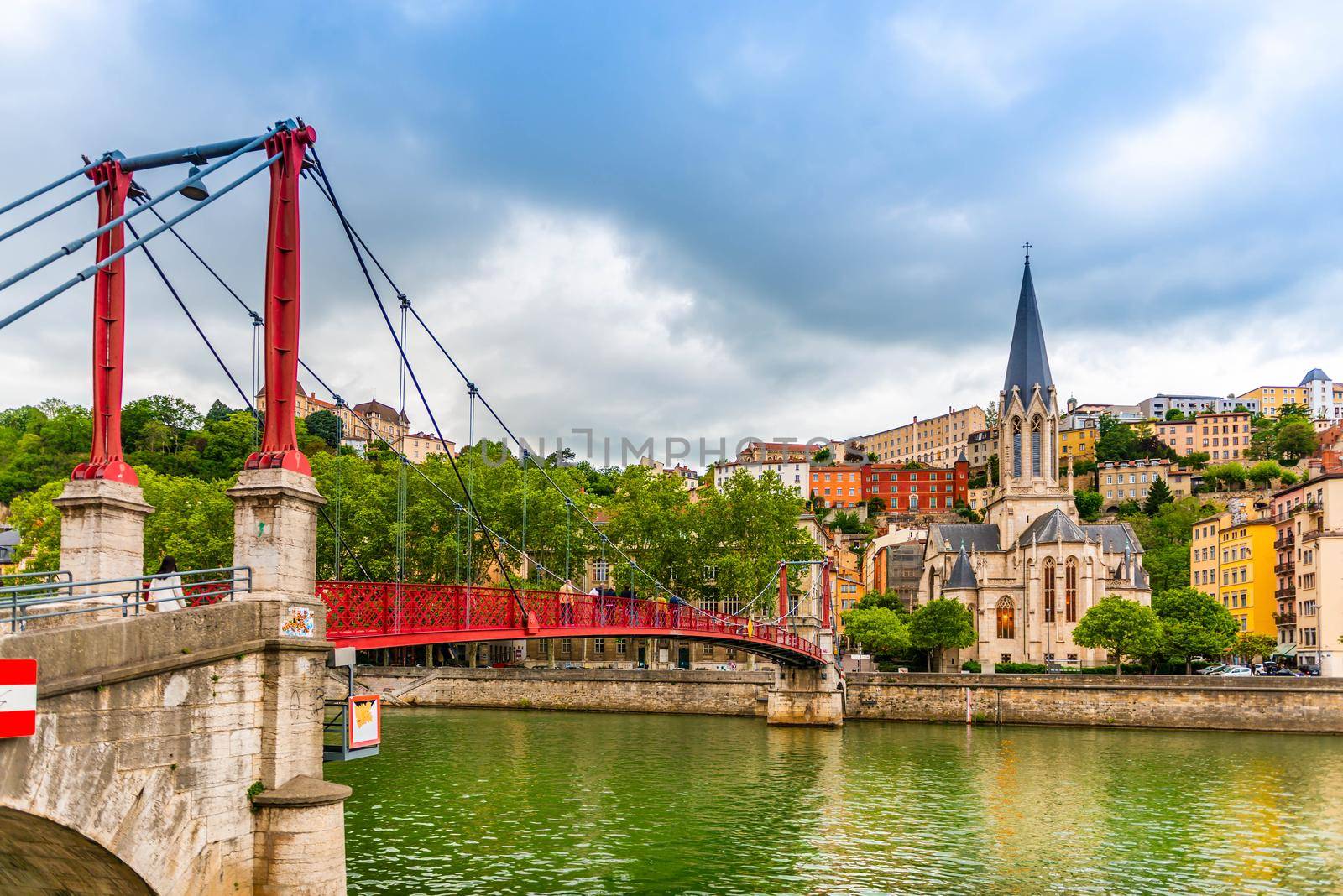 Footbridge over the Saone, and the Saint Georges church, in Lyon, in the Rhône, France by Frederic