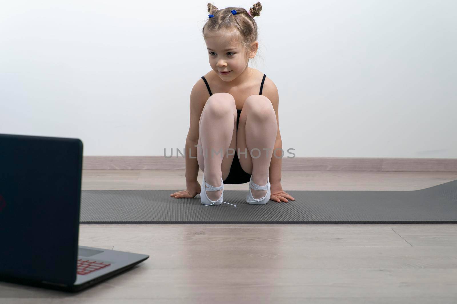 online training of a Caucasian girl gymnast 5 years old by Lena_Ogurtsova