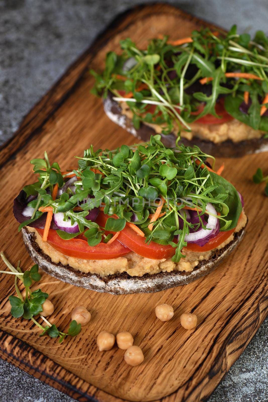 Vegetarian sandwich with microgreen by Apolonia