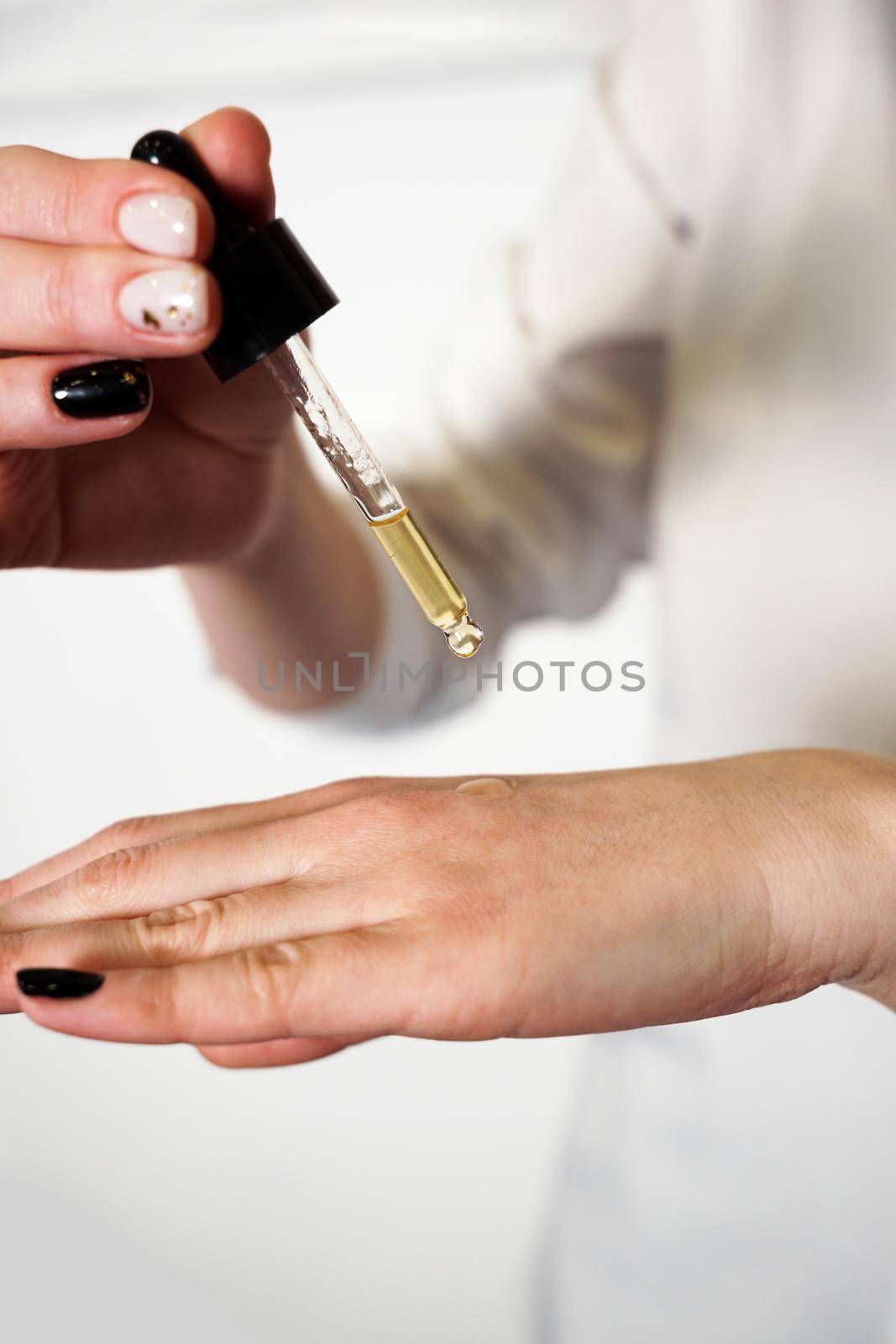 Beautiful female hands. Hand skin care. Beautiful Woman Hands. Skin oil. by natali_brill