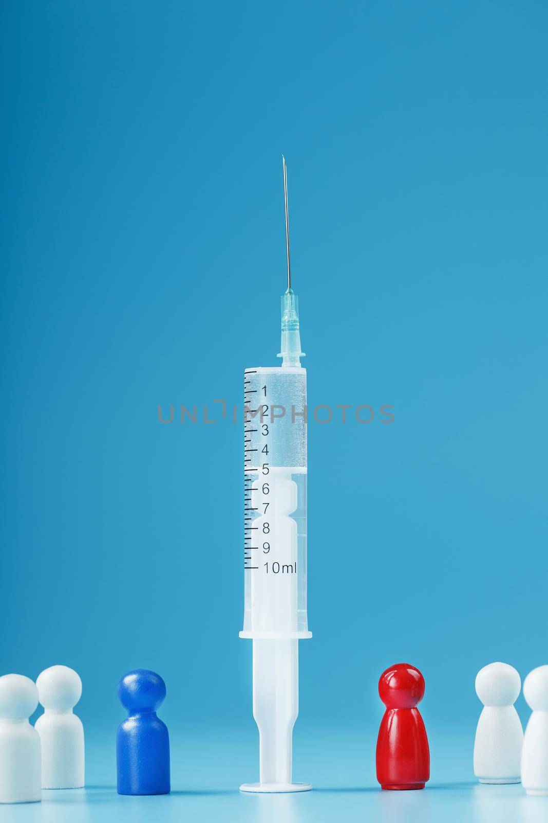 A syringe with a vaccine in the center with a blue and red man with a crowd of whites on a blue background. by AlexGrec