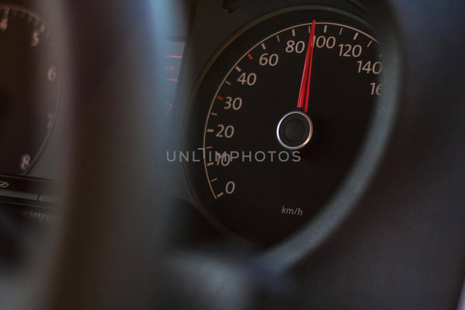 high speed on speedometer in automobile on dark background by dreamloud