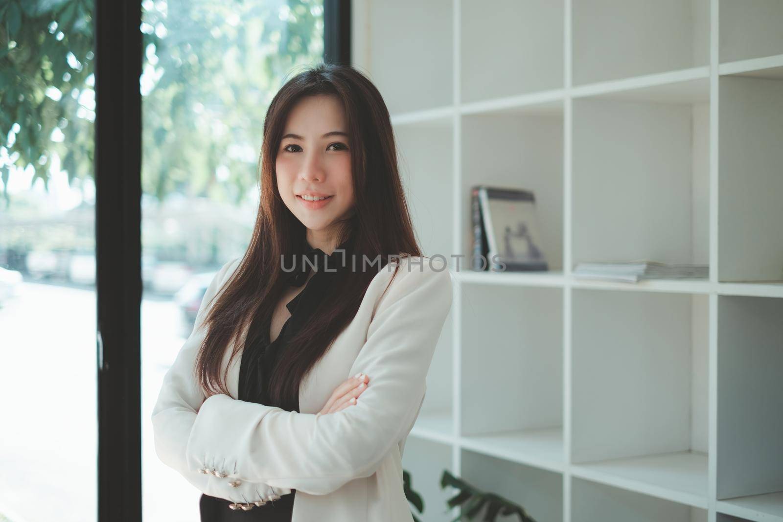Portrait of Representative business woman smiling at her account company office. audit consult concept. by itchaznong