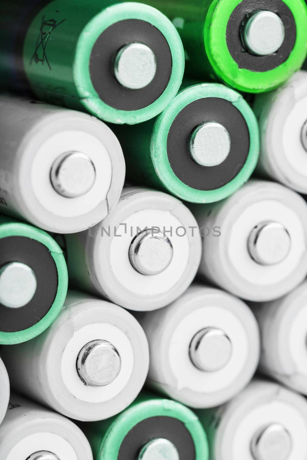 AA batteries as a texture background in full screen. The concept of energy supply and rational utilization