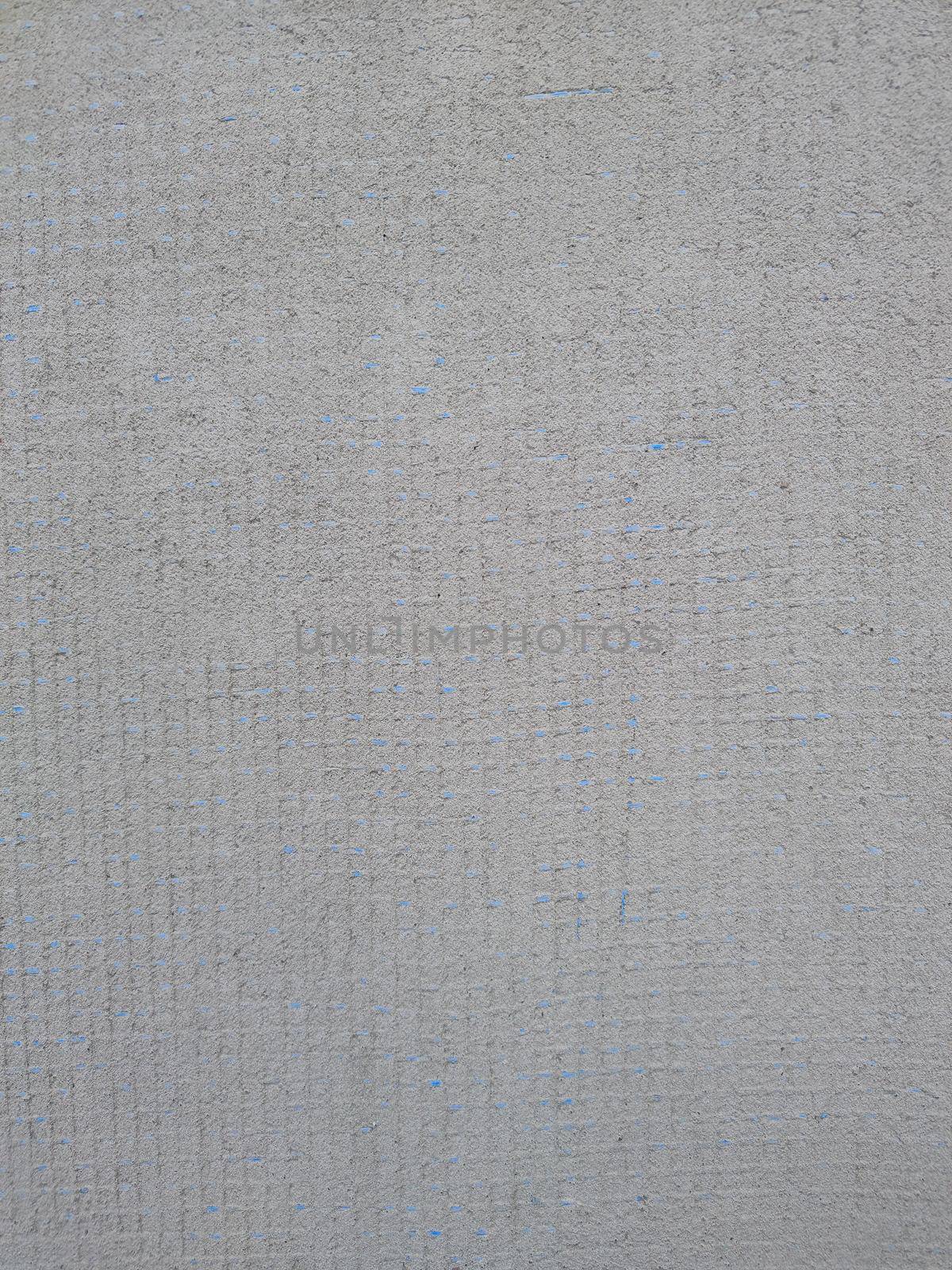 Background cement sand plaster, with blue reinforcing mesh