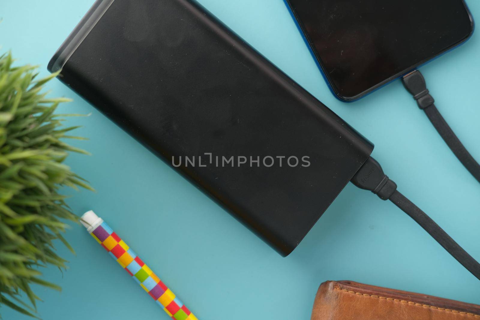 smart phone charging with Power bank top view.