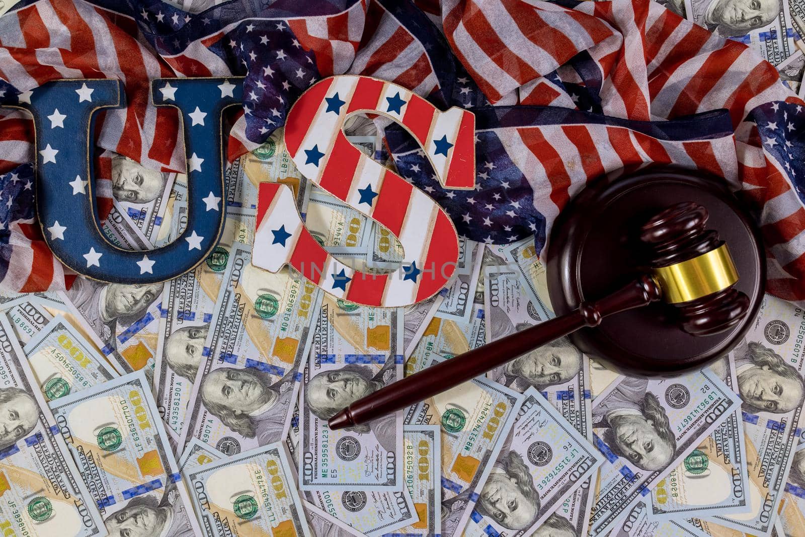 American economic sanctions with US dollars banknotes Judge gavel USA flag of US financial regulation