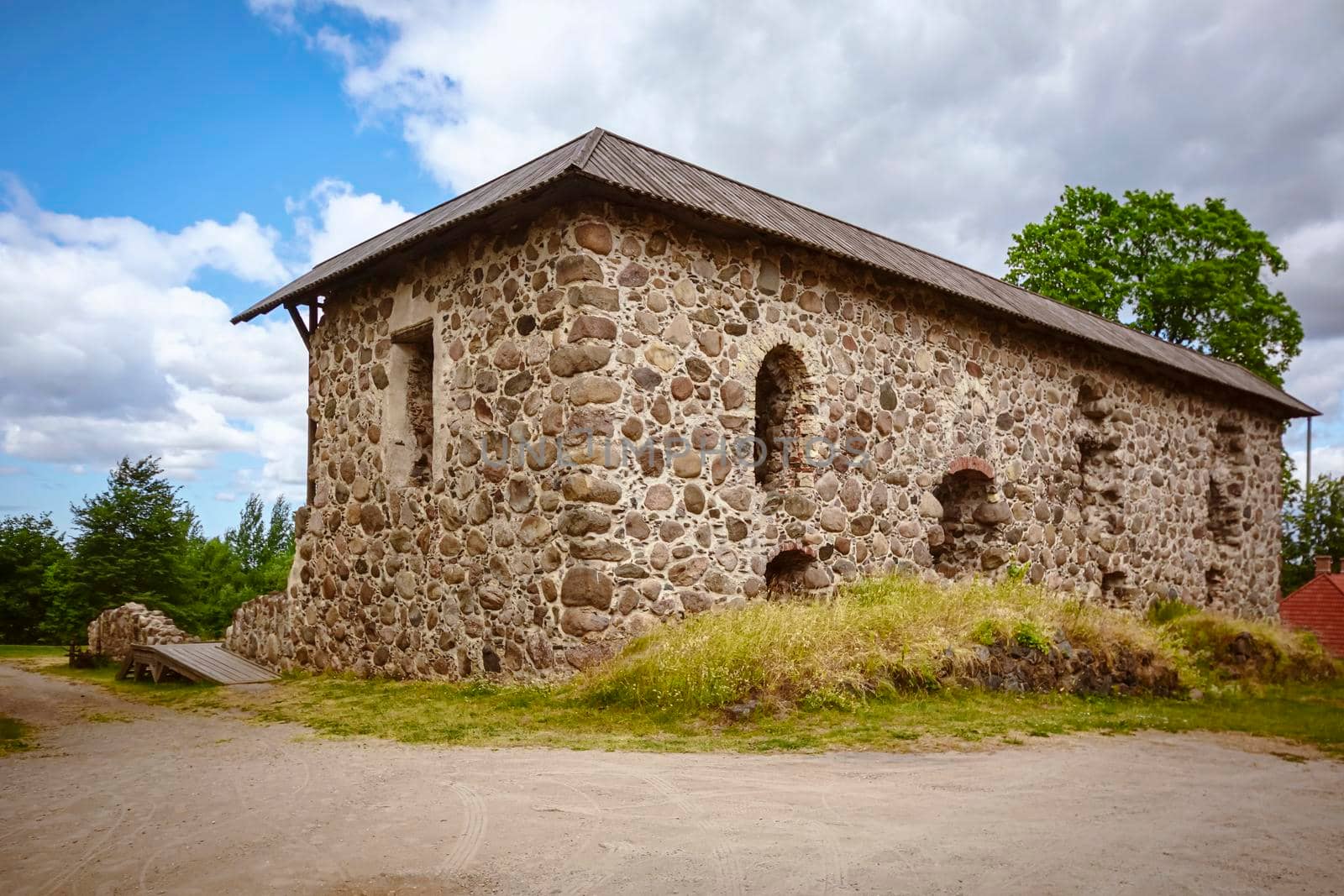 Old stone building in rural area. Latvia