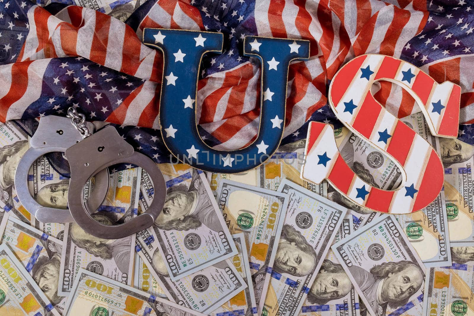 American financial arrest of property economic US sanctions regulation with USA flag US dollars banknotes Judge gavel
