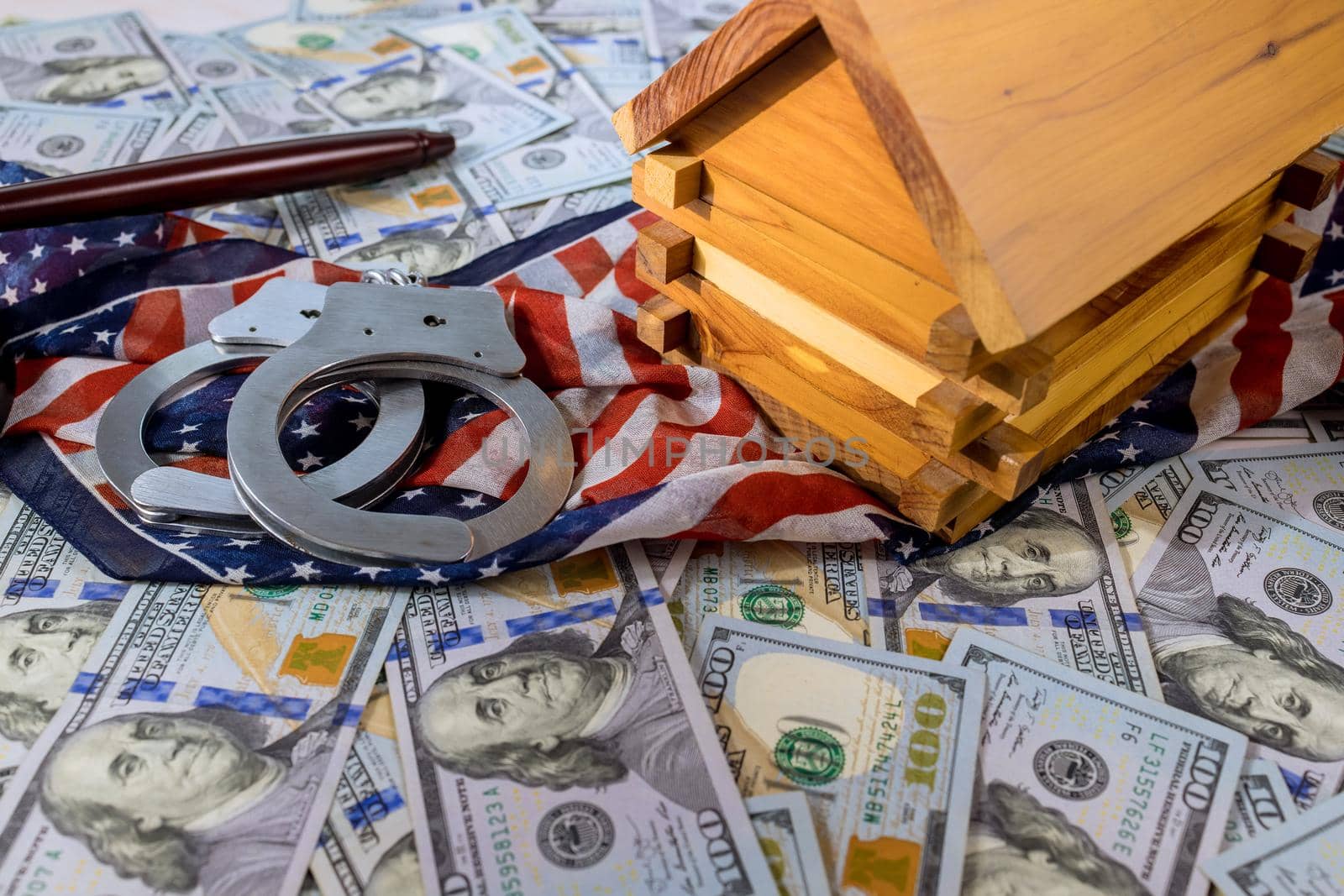 American court imposed an arrest to on house of the sanctions property with US dollars banknotes handcuffs Judge gavel