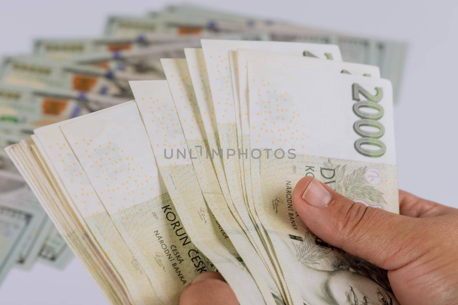 Close-up Czech koruna banknotes in man counting money paper banknote