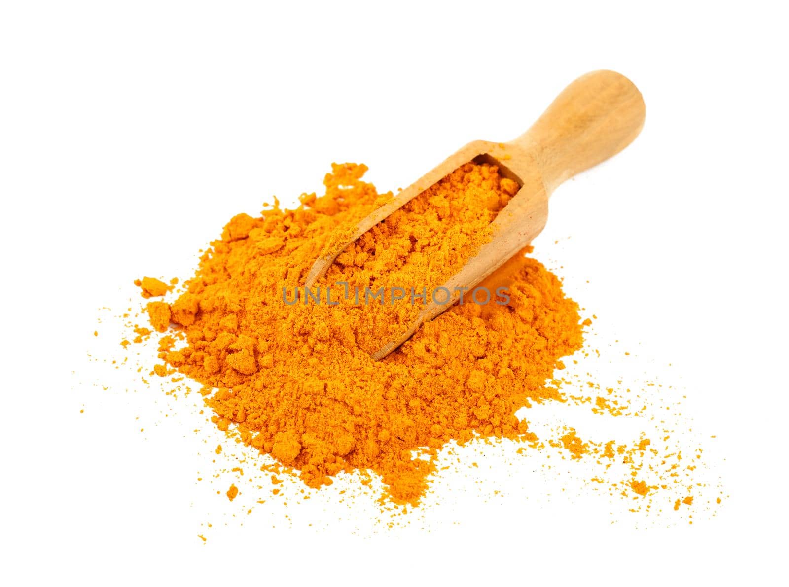 Wooden scoop full of yellow turmeric powder by BreakingTheWalls