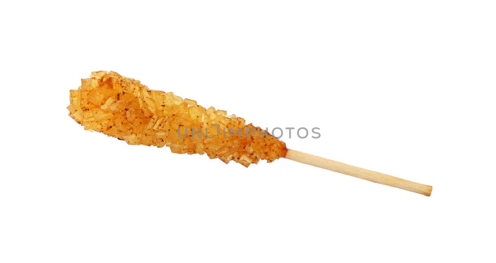 Close up one wooden stick with brown yellow sugar crystals isolated on white background, elevated top view, directly above