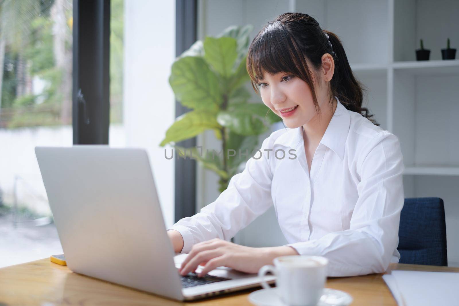 E-learning ,online ,education and internet social distancing protect from COVID-19 viruses concept. Asian woman student video conference e-learning with teacher on digital tablet at home